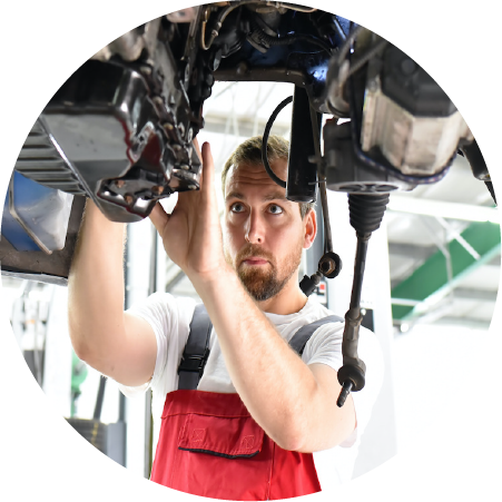 Person Working on Piece of Machinery